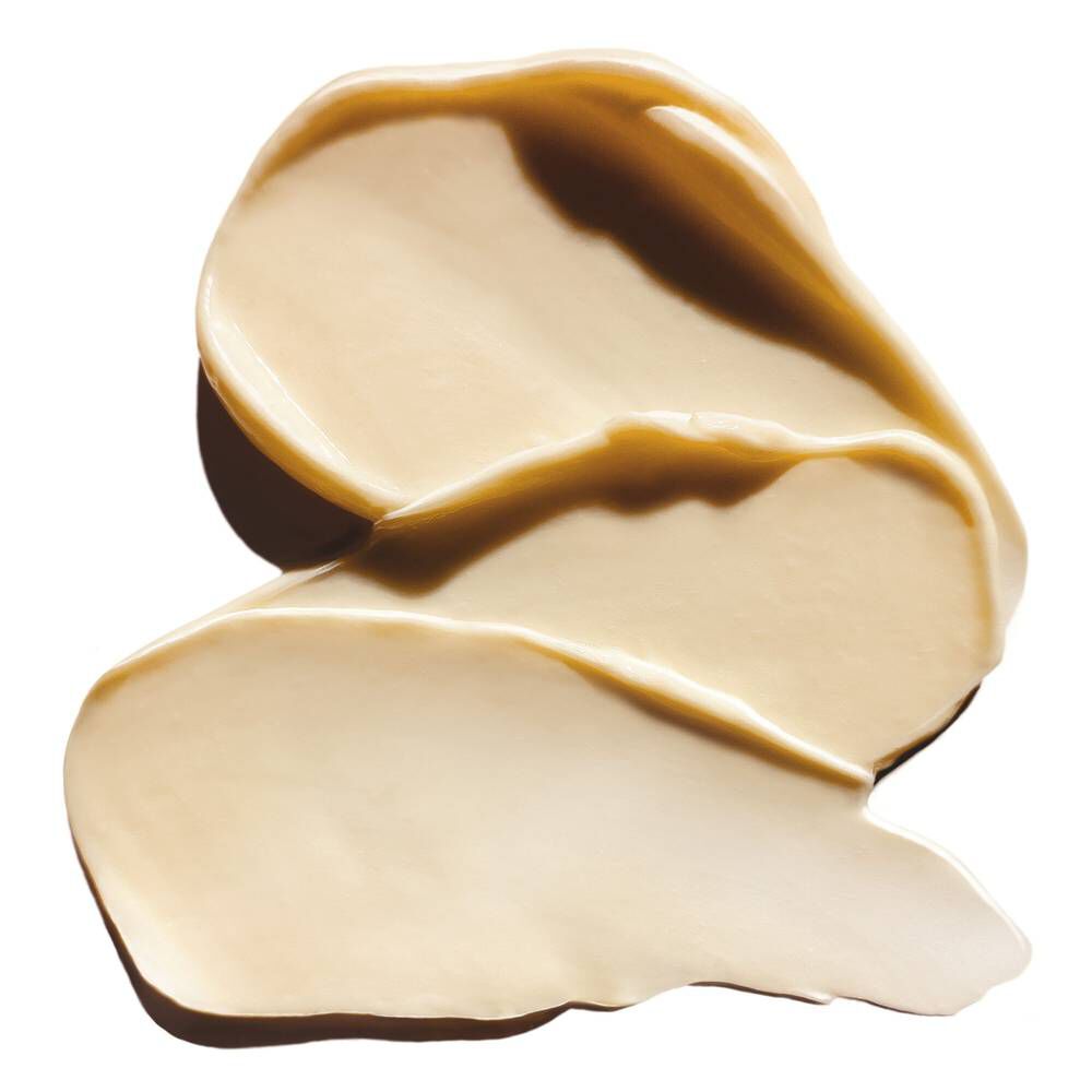Goldene cremige Textur der Absolut Repair Golden Masque